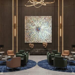 Abstract universe painting called Star is born (on the wall) by Keren de Vreede